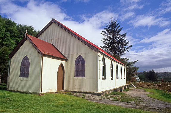 SCO: Highland Region, Sutherland District, Northern Coast, Bettyhill, Skerray (crofters village), Skerray Free Church, a brightly painted corrugated tin building. [Ask for #246.827.]