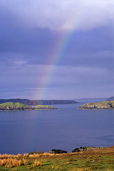 SCO: Highland Region, Sutherland District, Northern Coast, Kyle of Tongue, Talmine (crofters village), Rainbow over the Kyle of Tongue, viewed from sea cliffs near Talmine. [Ask for #246.880.]
