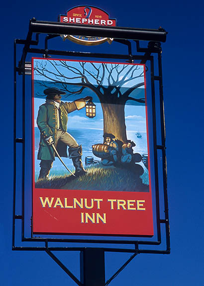 ENG: South East Region, Kent, The Upper Stour Valley, Aldington, Pub sign for the "Walnut Tree Inn", showing smugglers. [Ask for #256.497.]