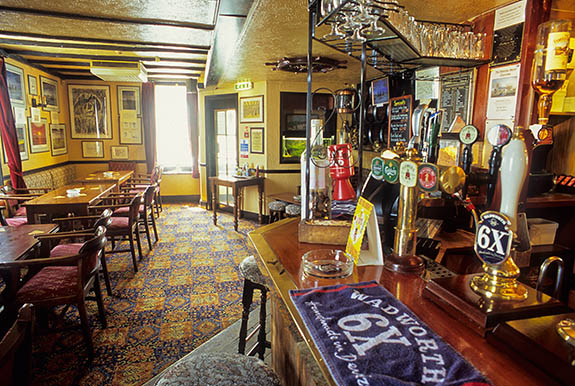 ENG: South East Region, Kent, Romney Marsh, Romney Marsh Beaches, Dymchurch, The Ship Inn, favored haunt of author Russell Thorndyke and his fictional character, Dr. Syn. Interior of lounge bar, showing cask ale pumps [Ask for #256.516.]