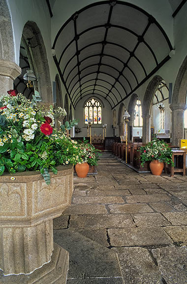 ENG: South West Region, Devon, Dartmoor National Park, Dartmoor's Southern Edge, Widecombe-in-the-Moor, St. Pancras Church, known as "The Cathedral of the Moor", interior, with carved stone font [Ask for #268.494.]